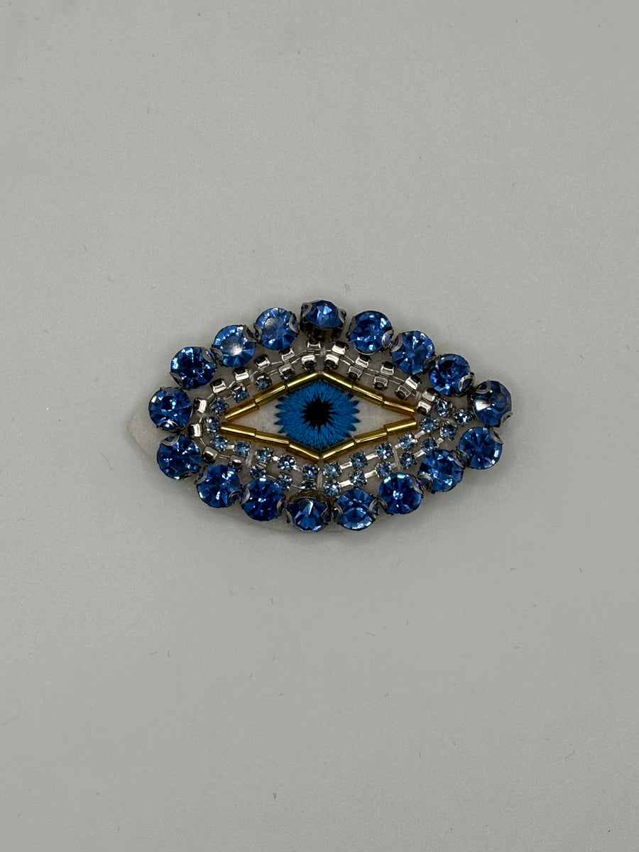 Hand-Sewn Beaded Evil Eye Brooch | Artisan Crystal Pin (Blue & Pink) – geometric; pink crystal, metal fashion jewelry, main product image, Petit Détail