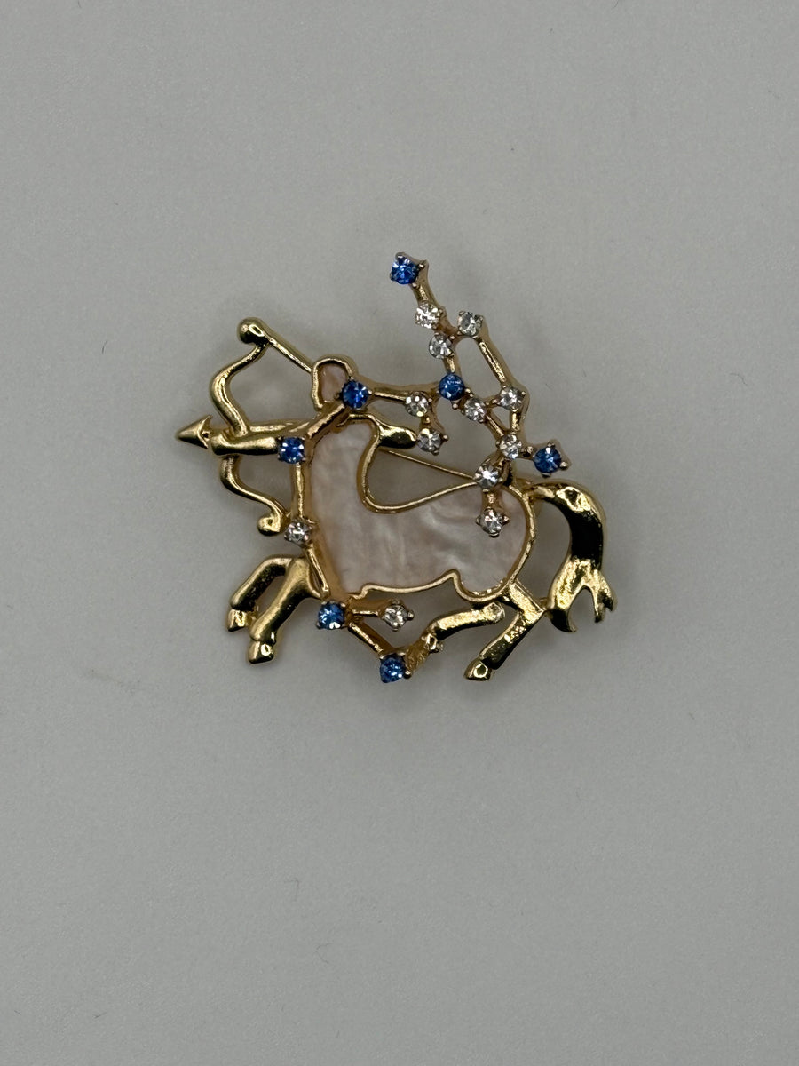 Sagittarius Zodiac Brooch | Gold Archer Horoscope Pin with Mother of Pearl – gold metal fashion jewelry, main product image, Petit Détail