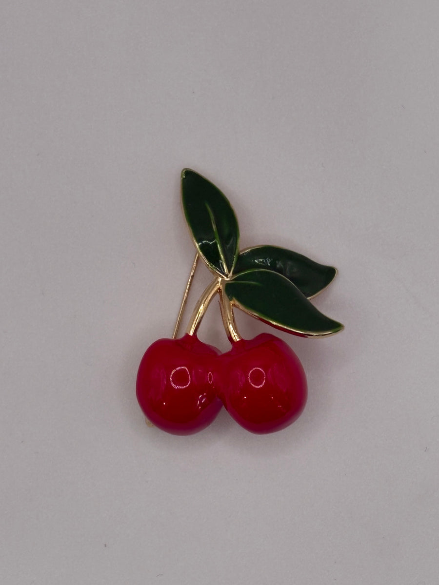 Glossy Twin Cherries Enamel Brooch | Gold-Tone Fruit Pin – red enamel, metal fashion jewelry, main product image, Petit Détail