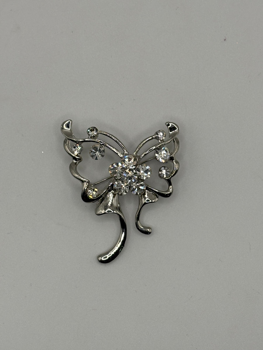 Silver-Tone Crystal Ribbon Butterfly Brooch | Whimsical Openwork Pin – silver metal fashion jewelry, main product image, Petit Détail