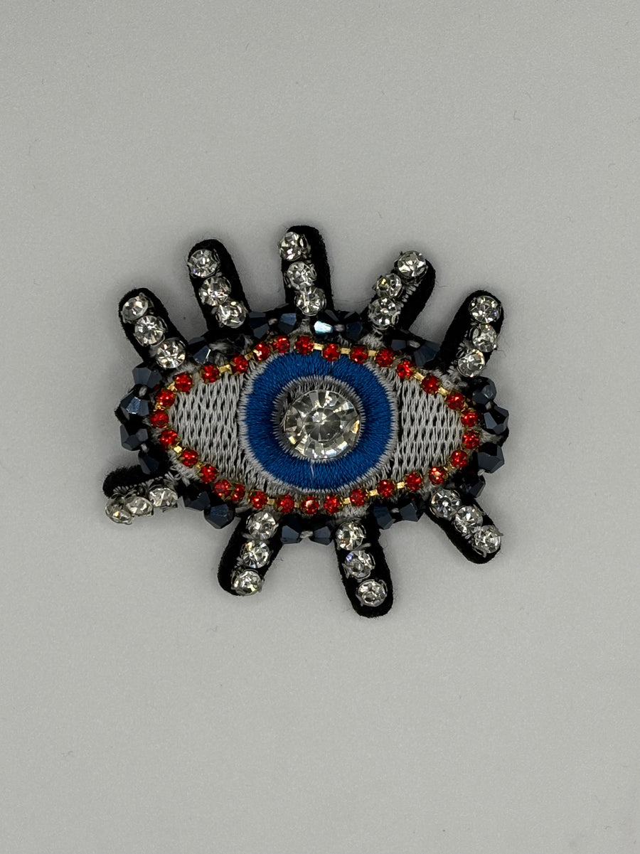 Hand-Embroidered Crystal Lash Evil Eye Brooch | Blue & Red Artisan Pin – blue-1 crystal, metal fashion jewelry, main product image, Petit Détail