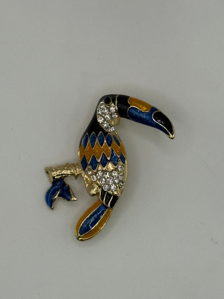 Tropical Enamel Toucan Brooch | Gold-Tone Bird Pin with Crystal Accents – geometric enamel, metal fashion jewelry, main product image, Petit Détail