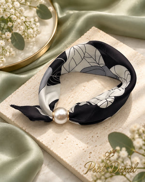 Black and ivory floral magnetic scarf styled with pearl magnetic closure