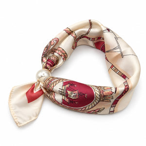 Ivory and burgundy equestrian print magnetic scarf with pearl magnetic closure on white background