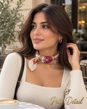 Woman wearing ivory and burgundy equestrian magnetic scarf with pearl magnetic closure