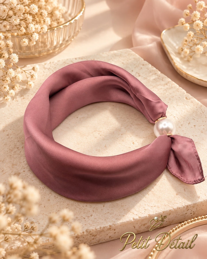 Dusty rose magnetic scarf with pearl magnetic closure on white background