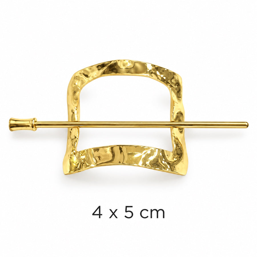 Hammered square gold-tone hair cuff with matching securing stick on white background, 4 x 5 cm