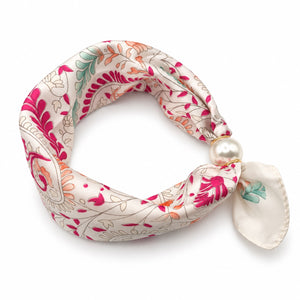 Ivory pink floral magnetic scarf with coral and teal accents and pearl magnetic closure on white background