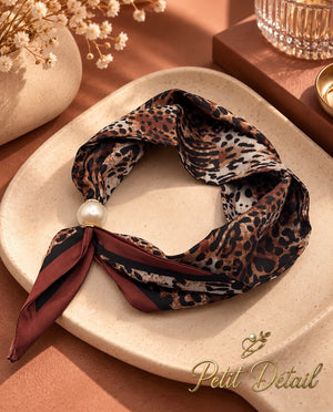 Leopard print magnetic scarf styled with pearl magnetic closure