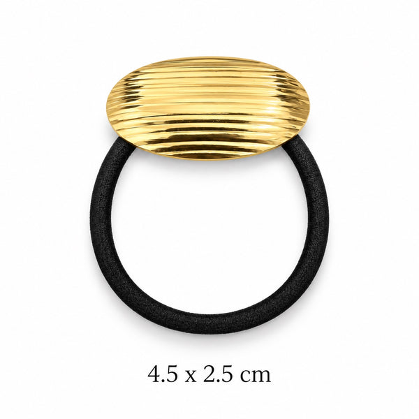Ribbed oval gold-tone hair cuff with black elastic on white background, 4.5 x 2.5 cm