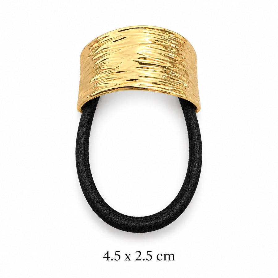 Ripple textured gold-tone hair cuff with black elastic on white background, 4.5 x 2.5 cm