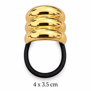 Rounded triple-ridge gold-tone hair cuff with black elastic on white background, 4 x 3.5 cm