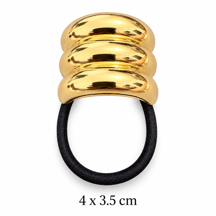 Rounded triple-ridge gold-tone hair cuff with black elastic on white background, 4 x 3.5 cm