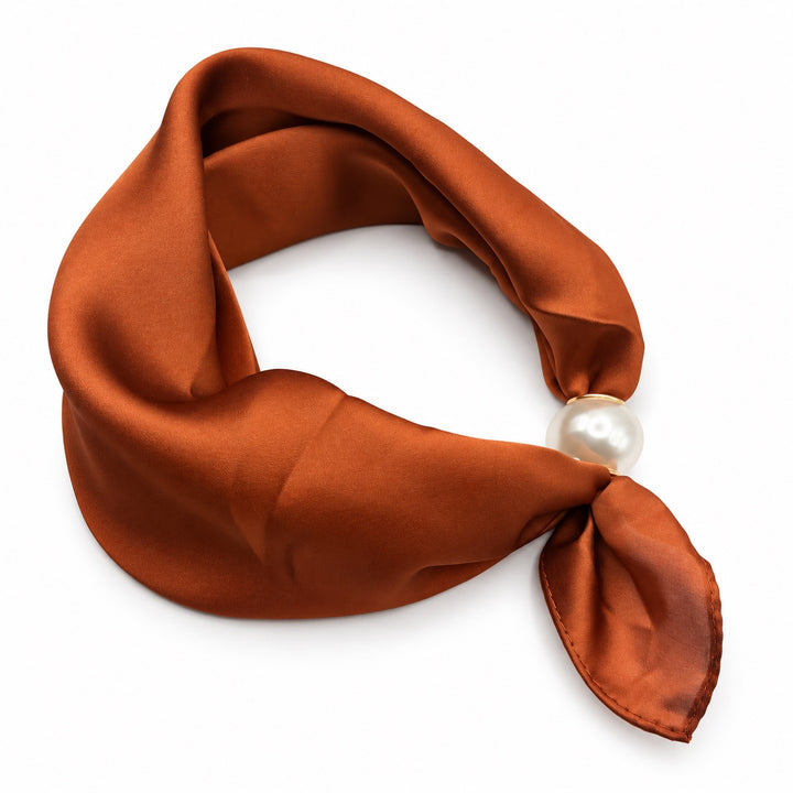 Rust satin magnetic scarf with pearl magnetic closure on white background