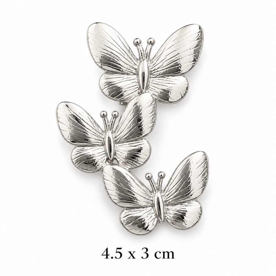 Silver triple butterfly brooch, 4.5 x 3 cm