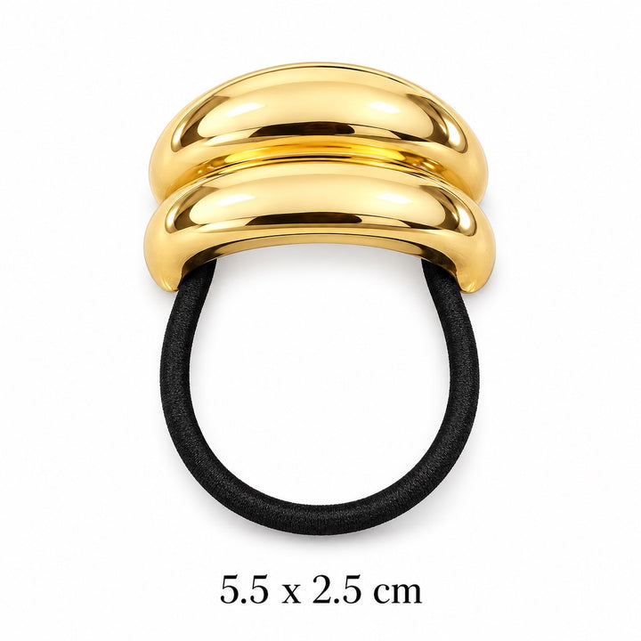 Smooth polished gold-tone double-dome hair cuff with black elastic on white background, 5.5 x 2.5 cm