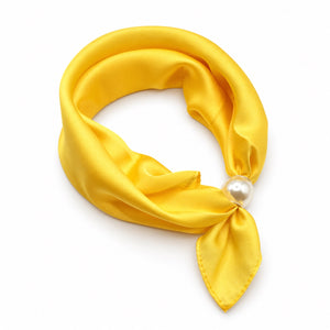 Sunshine yellow magnetic scarf with pearl magnetic closure on white background
