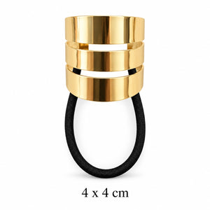 Polished gold-tone triple-band hair cuff with black elastic on white background, 4 x 4 cm